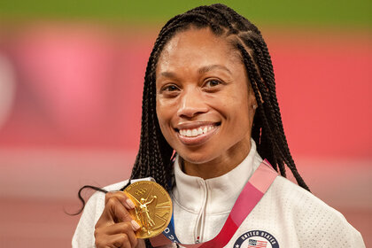 Allyson Felix with her gold medal after the U.S. team won the 4x 400m relay final at the Tokyo 2020 Summer Olympics