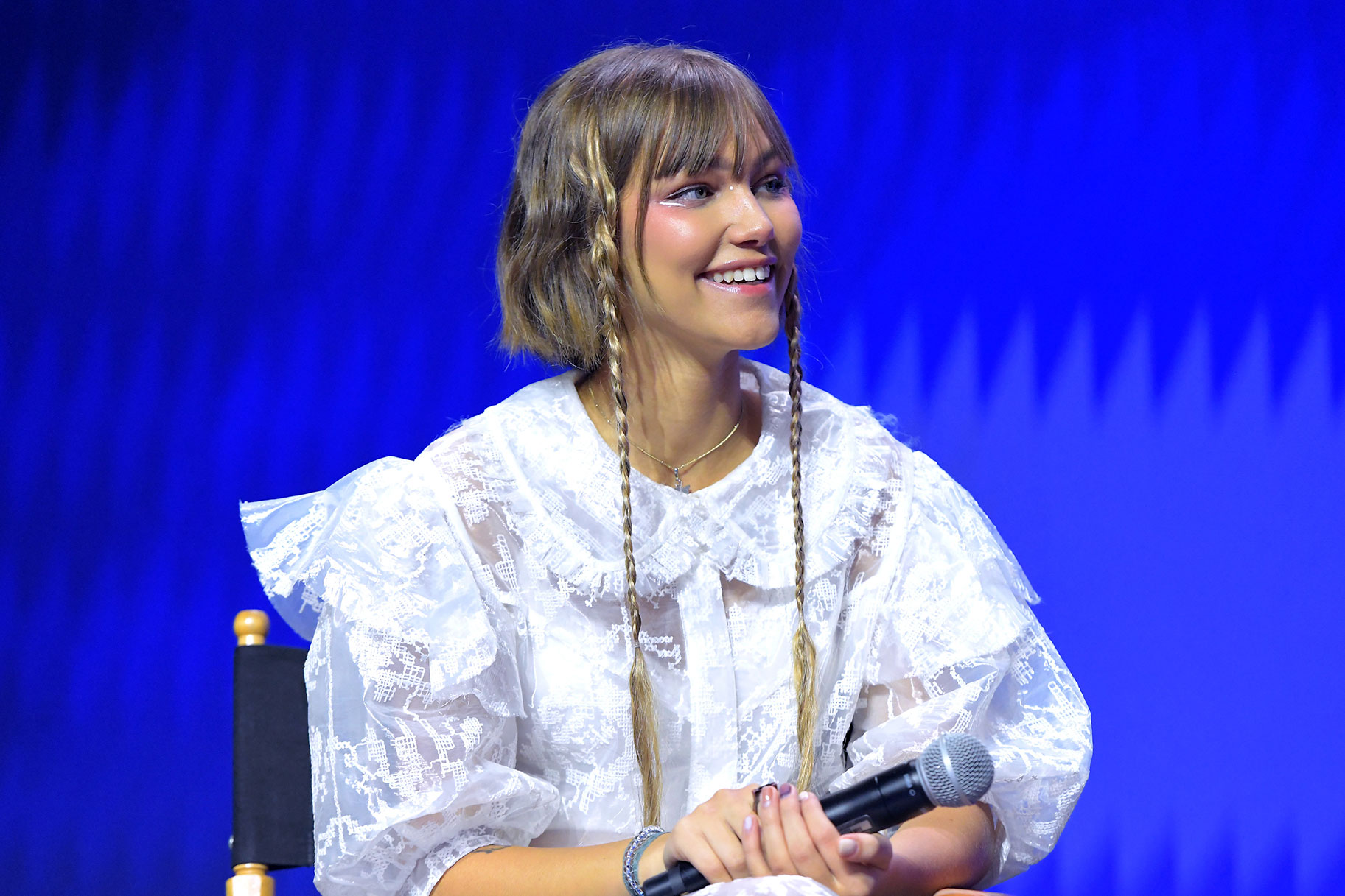 Grace Vanderwaal from America's Got Talent wearing a white dress