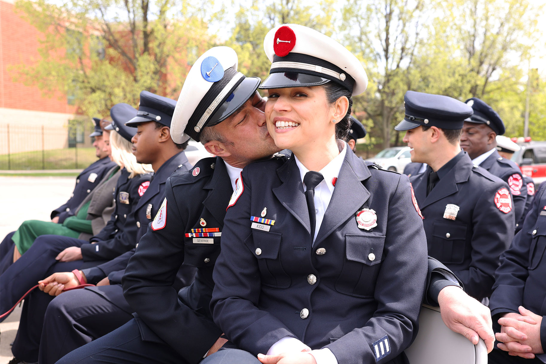 Kelley and Stella at a fire house ceremony