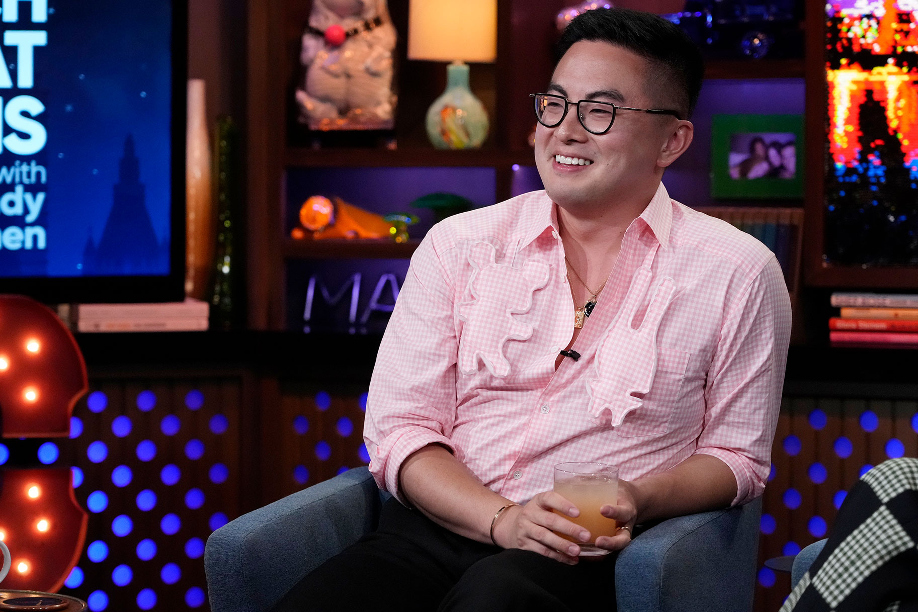 Bowen Yang seated on the set of 'Watch What Happens Live'