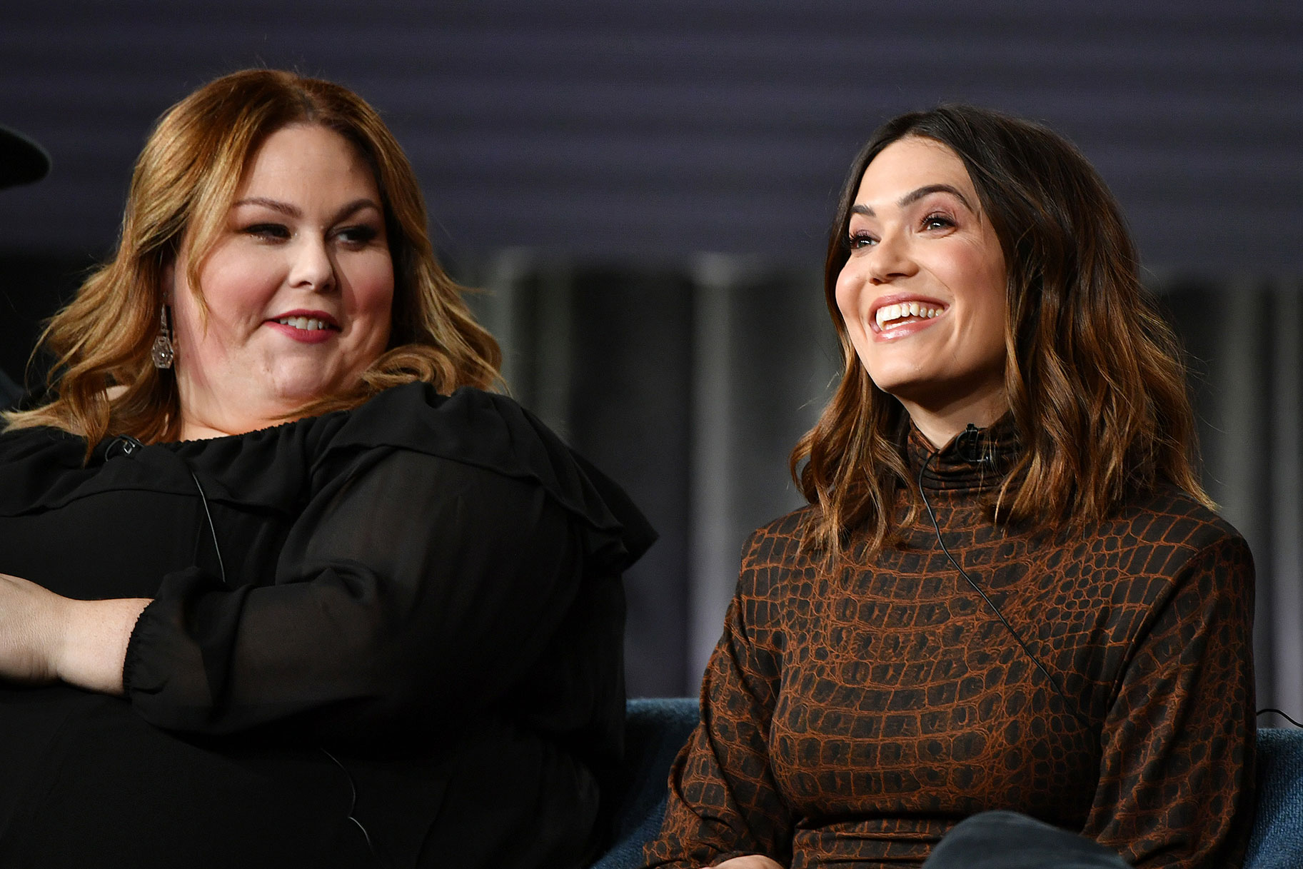 Chrissy Metz and Mandy Moore seated together, smiling