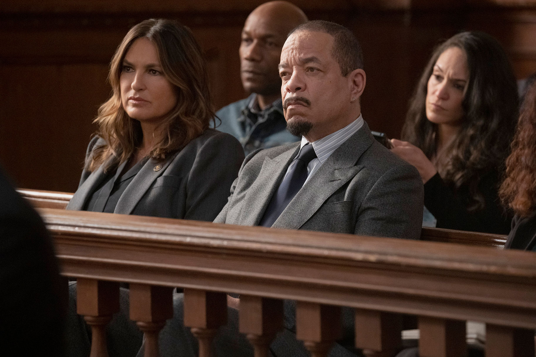 Captain Benson and Sergeant Odafin "Fin" Tutuola sitting at the back of a courtroom