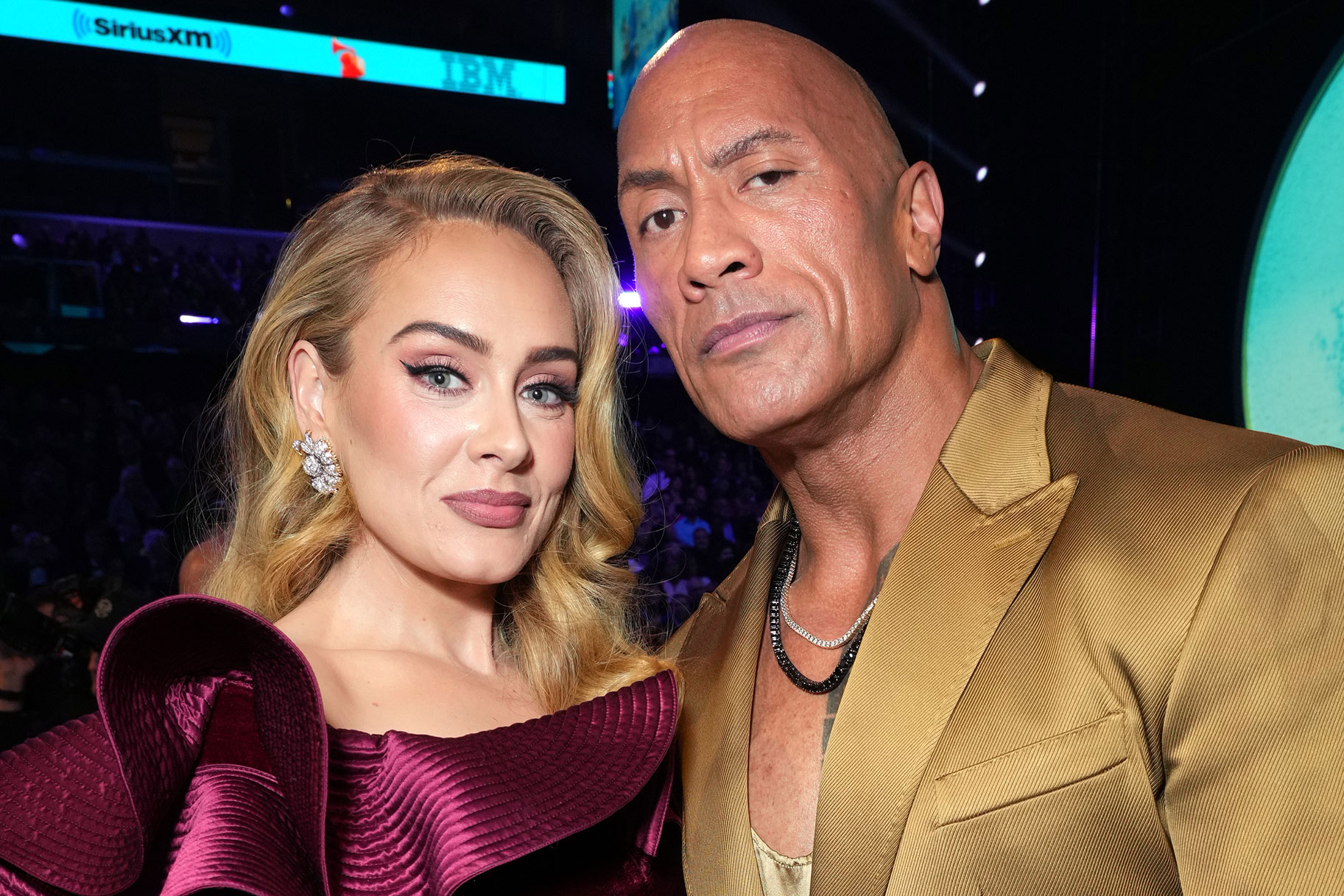Adele and The Rock attend the Grammys