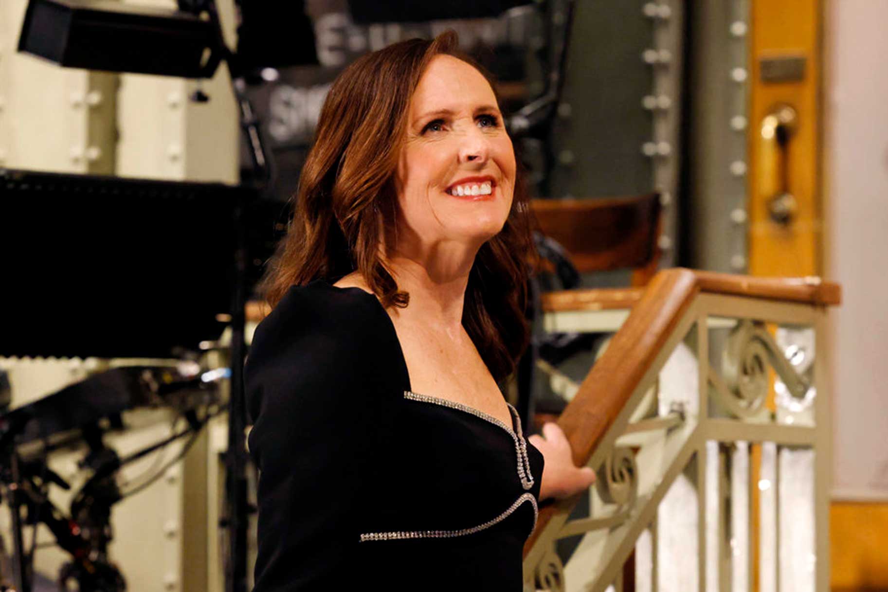 Molly Shannon smiling on the set of Saturday Night Live.