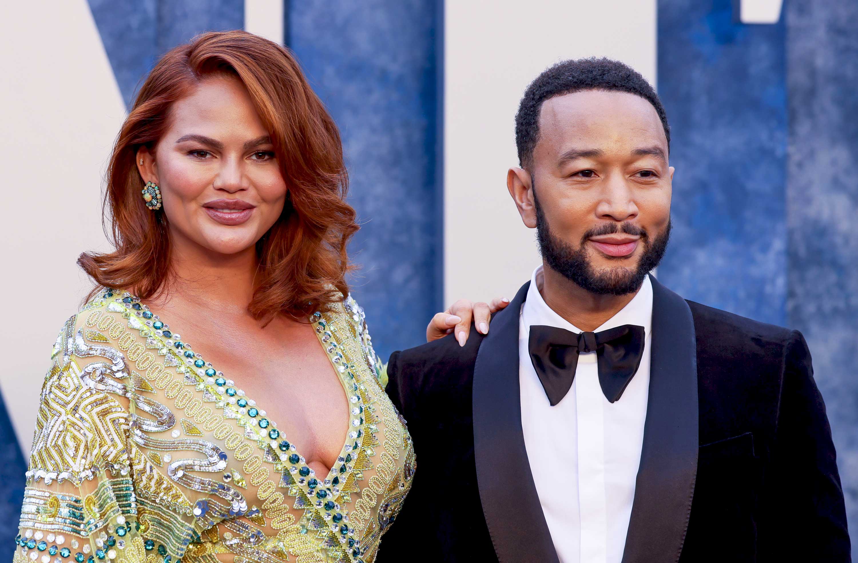 John Legend Wears Pink, Gives Chrissy Teigen a Kiss on Her Bday