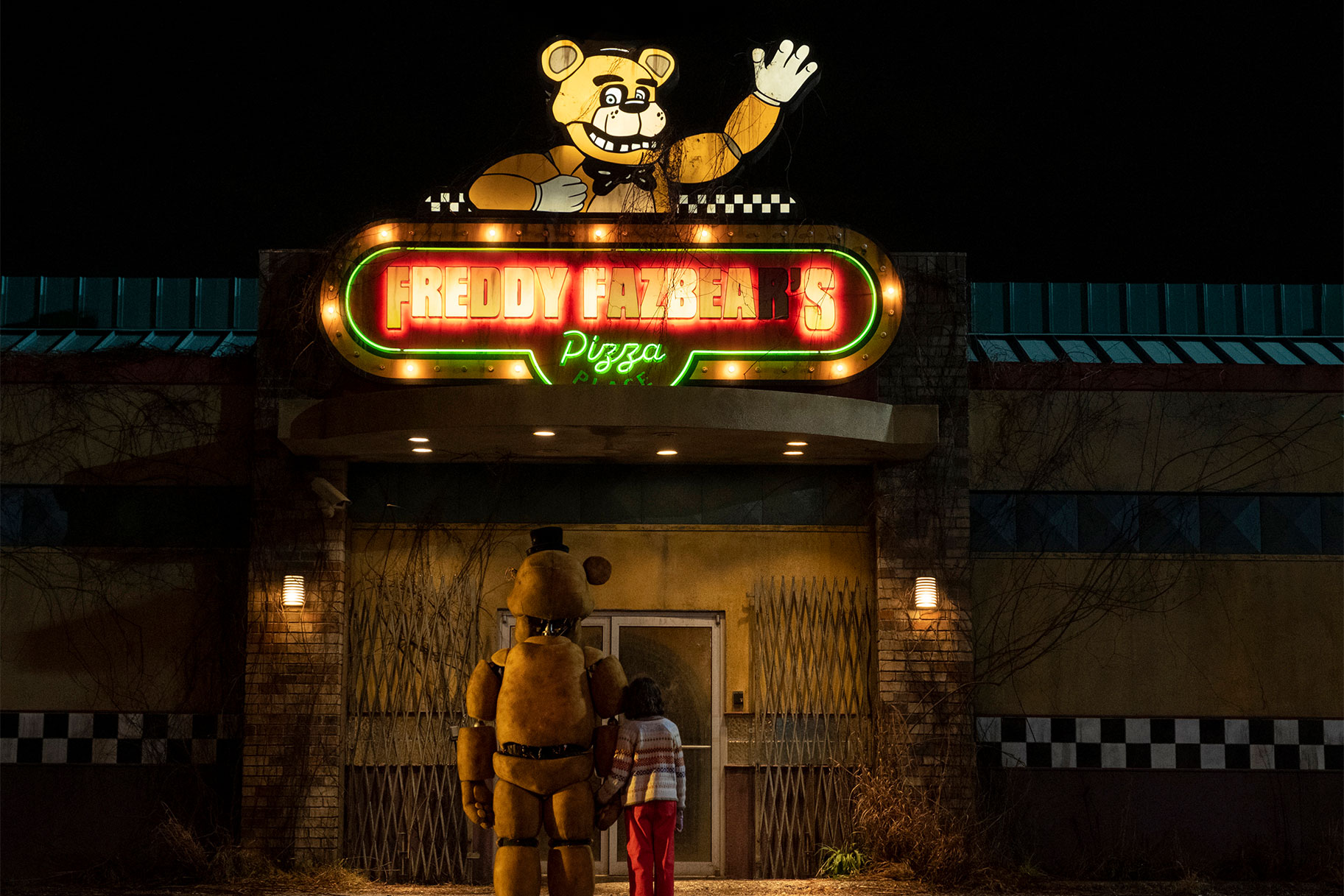 Exterior shot of Freddy's Pizza Place at night