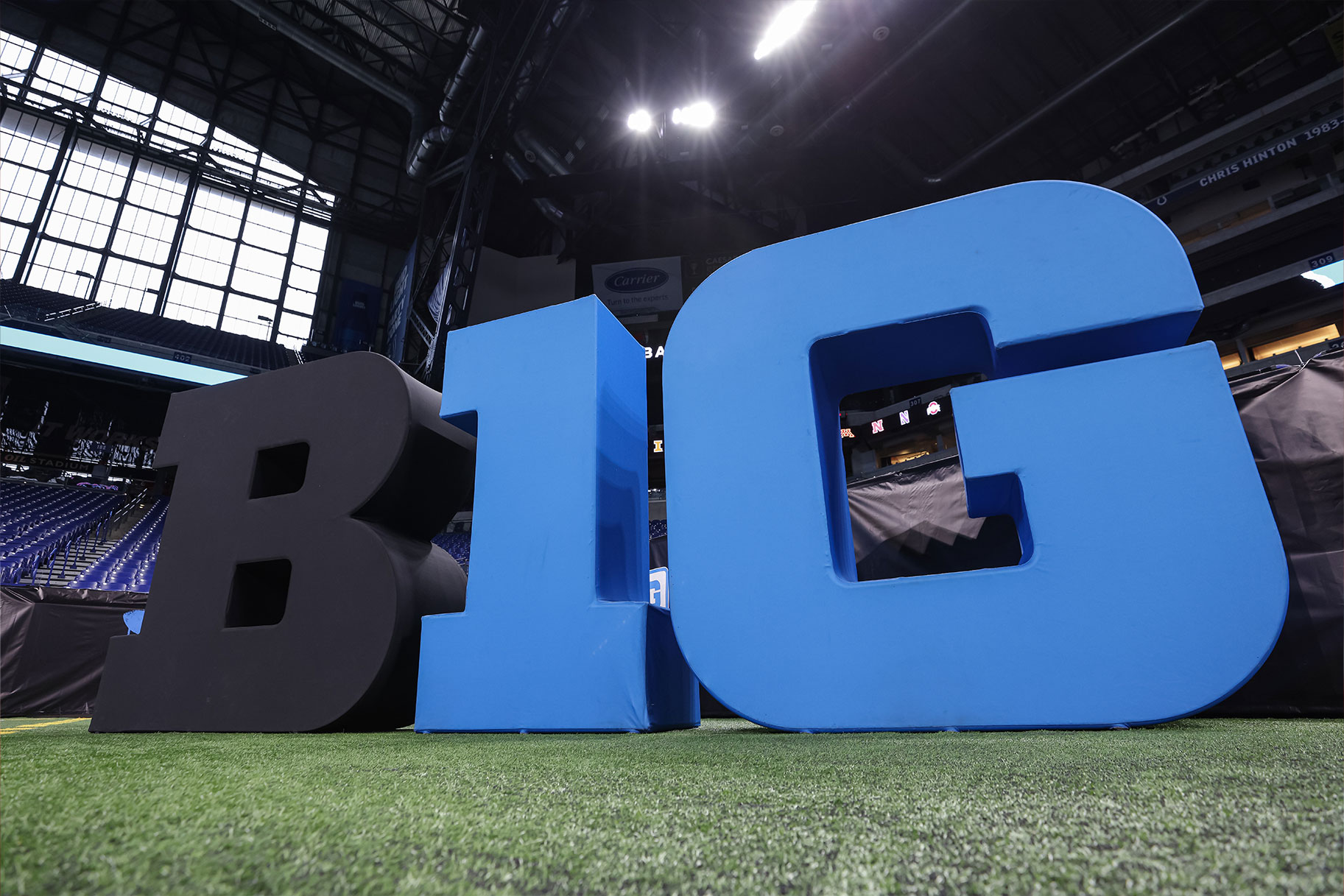 A large Big Ten logo on the field