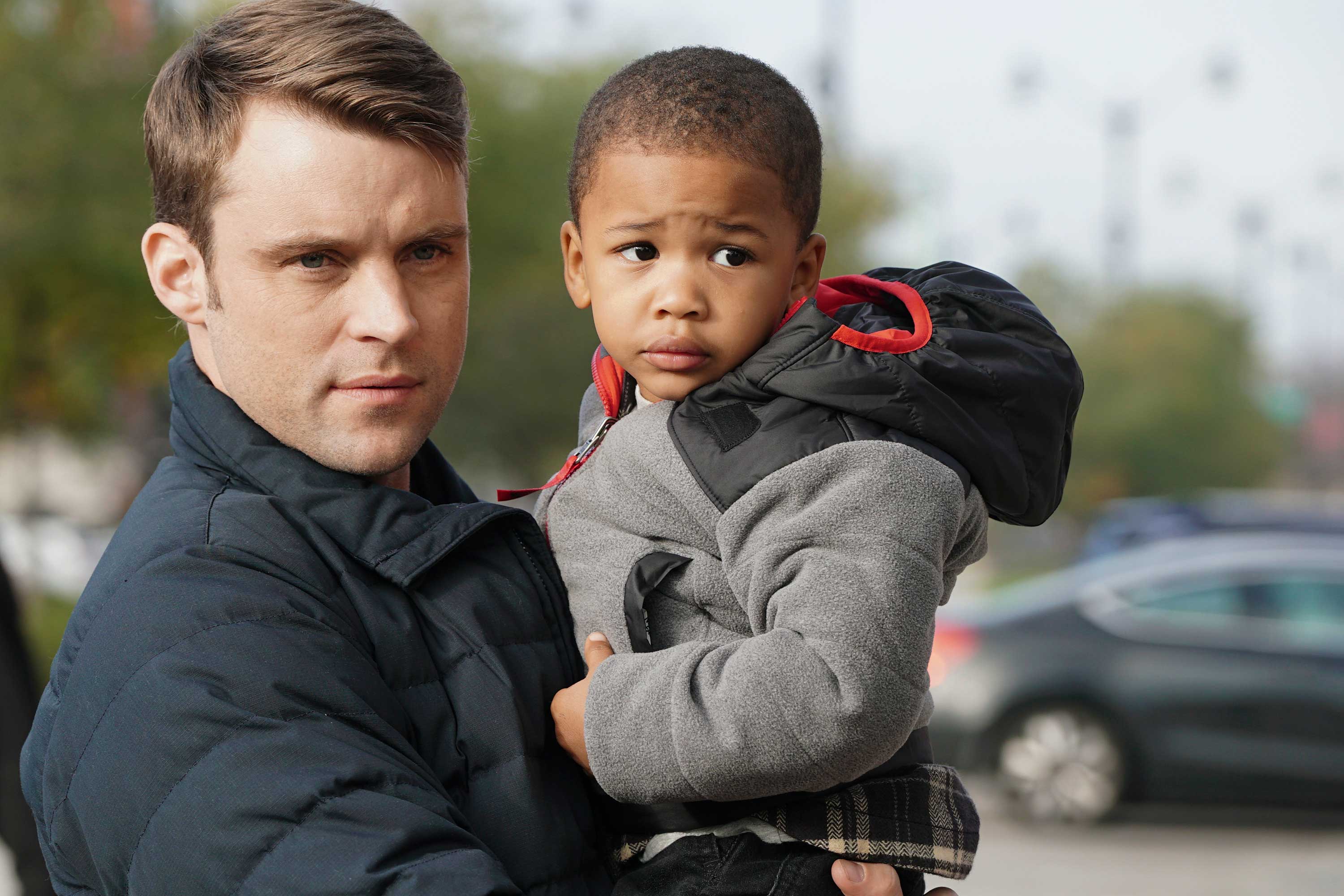 Matthew Casey and Louie appear in a scene from Chicago Fire.