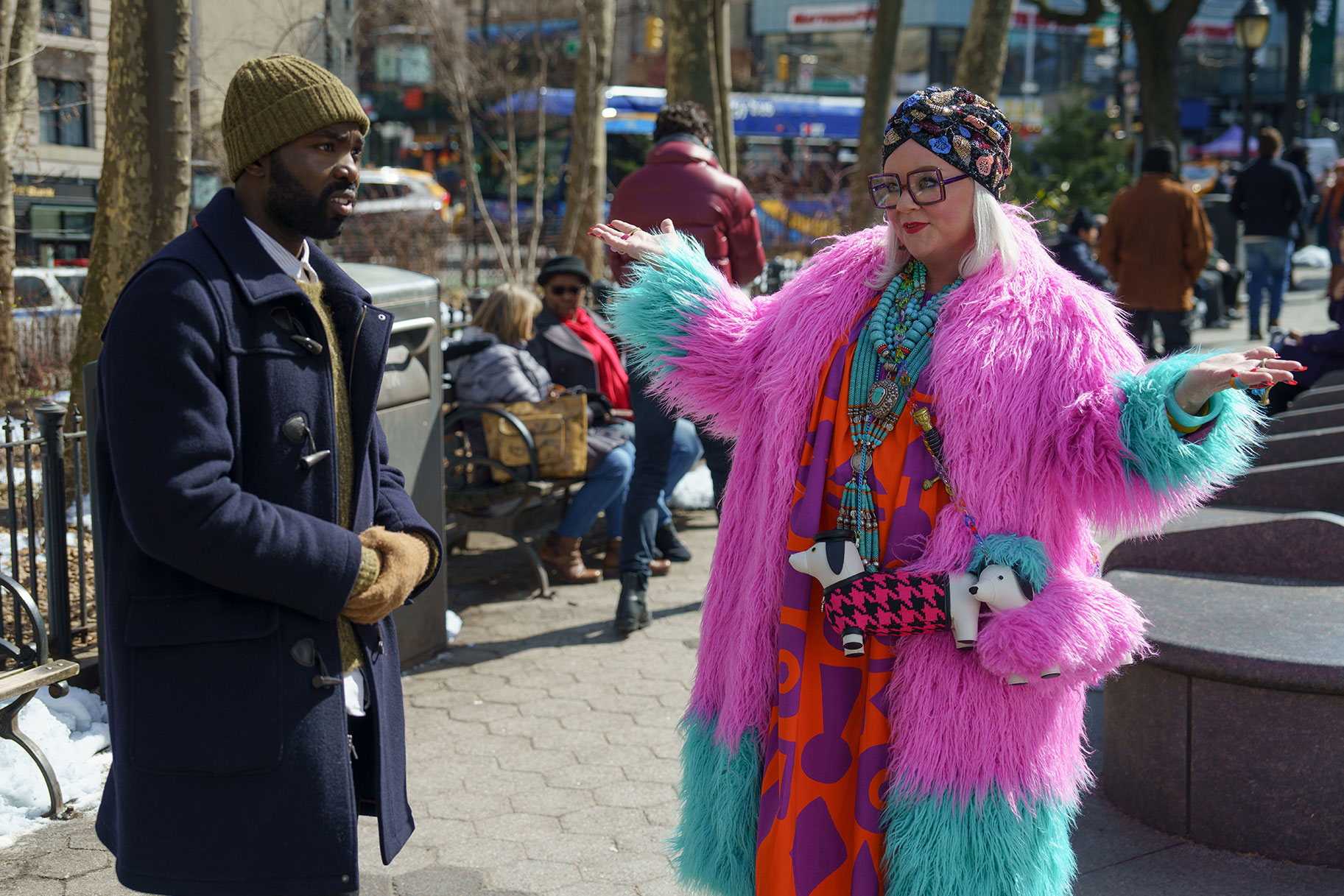 Paapa Essiedu and Melissa McCarthy stand outside in a scene from the new movie GENIE