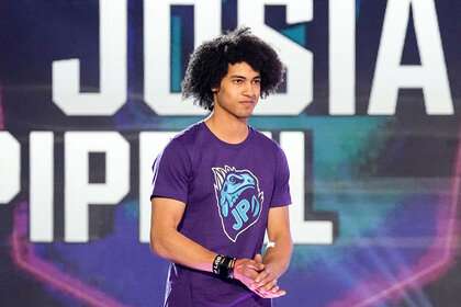American Ninja Warrior Josiah standing onstage