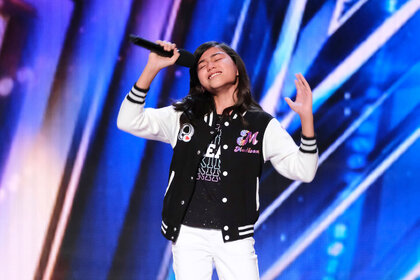 Maddie Baez singing on the Americas Got Talent stage