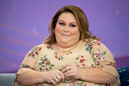 Chrissy Metz with a sly smile on her face
