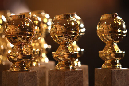 A row of Golden Globe awards