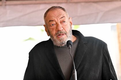 Dick Wolf presenting on stage during Ice-T's Hollywood Walk of Fame Ceremony.