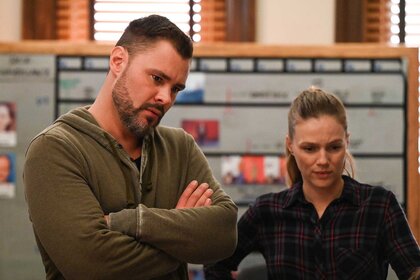 Patrick John Flueger and Tracy Spiridakos shown together during a scene in Chicago P.D.