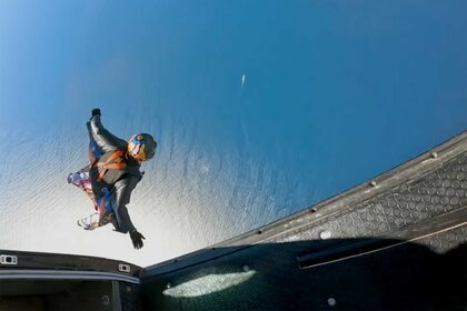 Orlando Bloom skydiving into the ocean.