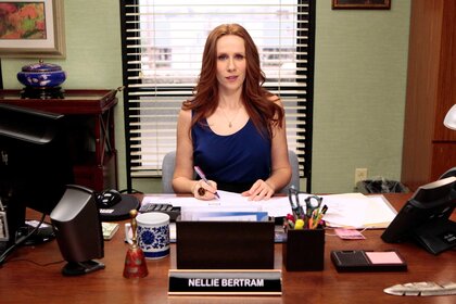 Nellie Bertram appears in a scene from The Office.