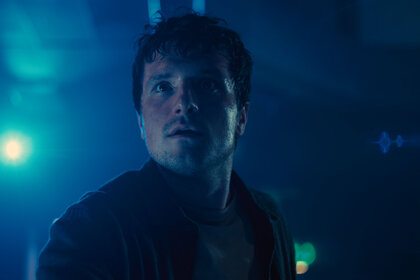 Josh Hutcherson in a dimly lit scene in Five Nights at Freddy's