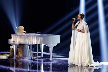 Putri Ariani playing piano and Leona Lewis singing during America's Got Talent.