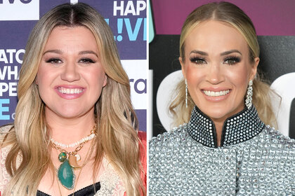 (l-r) Kelly Clarkson smiling and Carrie Underwood smiles wearing a silver jacket