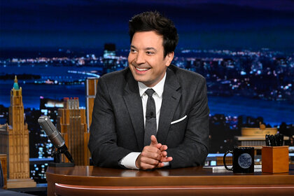 Jimmy Fallon sits at his desk on The Tonight Show Starring Jimmy Fallon episode 1859