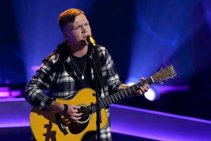 Noah Spencer performs onstage during the Season 24 Episode 3 of The Voice