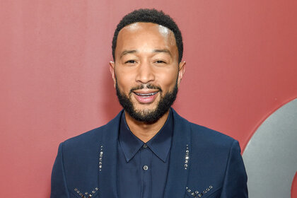John Legend on the red carpet at the GQ men of the year party