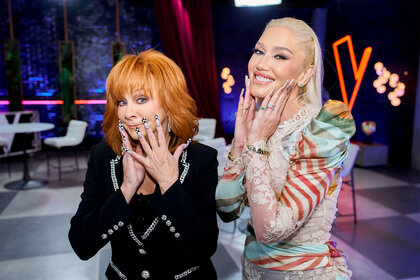 Reba McEntire and Gwen Stefani pose showing off their nails on The Voice Episode 2418