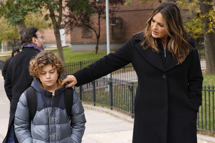 Olivia and Noah Benson walk down the street together on Law and Order SVU episode 2310