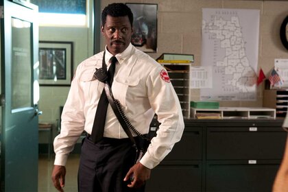 Chief Wallace Boden stands in an office on Chicago Fire Episode 101