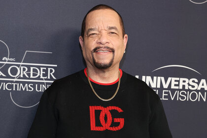 Ice T wears a black sweater with red writing on it at the Law & Order: Special Victims Unit Season 25 Anniversary