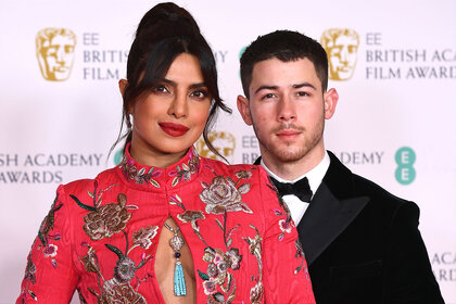 Priyanka Chopra and Nick Jonas pose for a photo at the EE British Academy Film Awards 2021