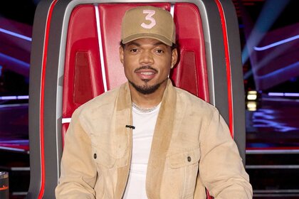 Chance The Rapper smiles in his coaches chair during The Voice Episode 2502