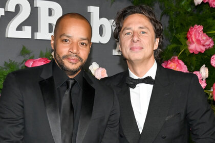 Donald Faison and Zach Braff pose together at the 2022 Baby2Baby Gala