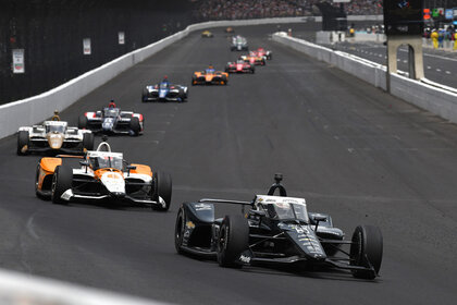 Patricio O'Ward leads teammate Felix Rosenqvist during the NTT IndyCar Series 107th Indianapolis 500