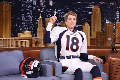Kristen Wiig is dressed as Peyton Manning on The Tonight Show Starring Jimmy Fallon.