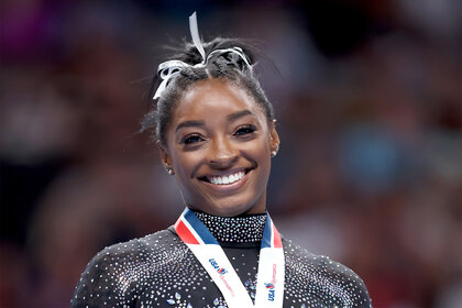 Simone Biles smiles on day four of the 2023 U.S. Gymnastics Championships