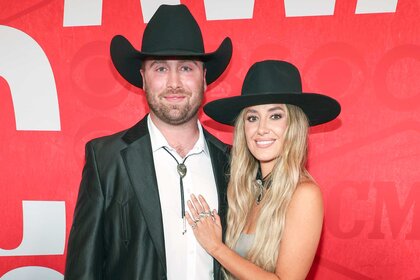 Lainey Wilson and Devlin Hodges pose together at the CMT awards