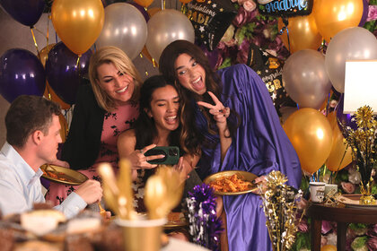 Dua Lipa holds up a peace sign during the “It’s There for Us” sketch