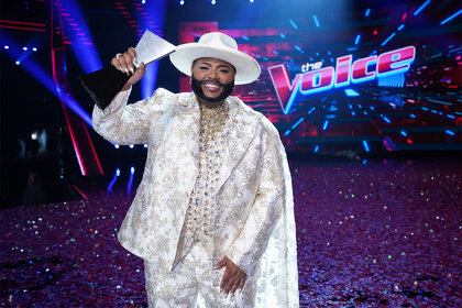 Asher HaVon on stage with the voice trophy during the live finale part 2