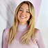 Sydney Sweeney smiles in a pink sweater at Ramscale Studio