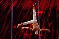 AGT's Aidan Bryant performing a stunt upside down
