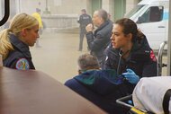 Sylvie Brett (Kara Killmer) and Jessica Chilton (Dora Madison) in a scene from Chicago Fire.
