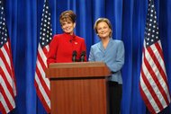 Tina Fey and Amy Poehler as Sarah Palin and Hillary Clinton during a skit on Saturday Night Live.