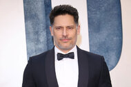 Joe Manganiello wearing a tuxedo attending Vanity Fair Oscar Party