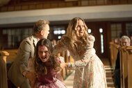Ketherine holds Miranda in a church in The Exorcist Believer