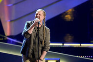 Huntley performs onstage during the Season 24 Episode 7 of The Voice