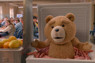 Ted sits in a box of hotdogs on Season 1 episode 1 of Ted
