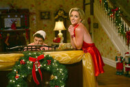 Jenna Maroney leans on a piano during Episode 306 of 30 Rock