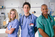 Sarah Chalke as Dr. Elliot Reid, Zach Braff as Dr. John 'J.D.' Dorian, and Donald Faison as Dr. Christopher Turk in Scrubs